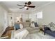 Cozy living room with hardwood floors, with views to the open concept dining room and kitchen at 848 Harrison St, Denver, CO 80206