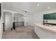 View from kitchen of an open dining area with carpet at 10578 E Jewell Ave, Aurora, CO 80012