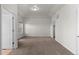 Spacious main bedroom with carpet and ample natural light at 10578 E Jewell Ave, Aurora, CO 80012