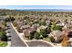 Aerial view of houses and neighborhood with mountain views in the background at 10654 Ashfield St, Highlands Ranch, CO 80126