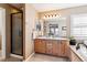 Bathroom with double vanity, shower, and linen closet at 10654 Ashfield St, Highlands Ranch, CO 80126