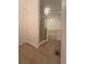 Bathroom with a glass-enclosed shower, tiled floors, and a relaxing bathtub for a spa-like experience at 15955 E Geddes Dr # 55, Aurora, CO 80016