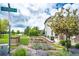 Attractive community sign amidst colorful landscaping, enhancing the neighborhood's welcoming appeal at 15955 E Geddes Dr # 55, Aurora, CO 80016