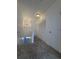 Upstairs hallway with carpeted floors, multiple closet doors, and an overhead light fixture at 15955 E Geddes Dr # 55, Aurora, CO 80016