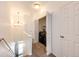 Upper level hallway with washer and dryer closet at 15955 E Geddes Dr # 55, Aurora, CO 80016