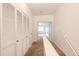 Well-lit upstairs hallway with plenty of closet space at 15955 E Geddes Dr # 55, Aurora, CO 80016
