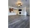 Spacious living room features hardwood floors, a fireplace, and an open layout ideal for entertaining at 15955 E Geddes Dr # 55, Aurora, CO 80016