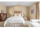 Serene bedroom with soft carpet, natural light, and comfortable seating at 1410 Exquisite St, Castle Rock, CO 80109