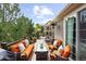 Spacious outdoor deck with stylish seating, perfect for relaxing and entertaining with wooded views at 1410 Exquisite St, Castle Rock, CO 80109