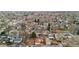 An aerial view of houses in a neighborhood with mature trees lining the streets at 2020 Gray St, Edgewater, CO 80214