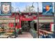 Edgewater Beer Garden with colorful decor, invites guests to enjoy food, brews, and the Town Square atmosphere at 2020 Gray St, Edgewater, CO 80214