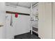 Practical mudroom with coat rack, providing a convenient entry space at 2020 Gray St, Edgewater, CO 80214