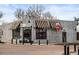 Suzette Bakery & Cafe on the corner with awnings, offers a charming and inviting place for baked goods at 2020 Gray St, Edgewater, CO 80214