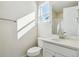 Clean bathroom with white vanity, quartz countertop and bathtub at 13905 Emerald Lake St, Parker, CO 80138