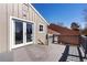 Relaxing back deck featuring wood railings, exterior access to the home and natural light during the day at 11404 E Yale Pl, Aurora, CO 80014