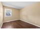 Cozy bedroom featuring hardwood floors, window and neutral paint at 11404 E Yale Pl, Aurora, CO 80014