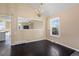 Cozy dining area with chandelier and hardwood floors, perfect for Gathering meals at 11404 E Yale Pl, Aurora, CO 80014