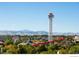 View of Denver Six Flags amusement park with tower and roller coaster at 1401 Wewatta St # 714, Denver, CO 80202