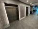 A modern elevator area, featuring multiple elevators and sleek design at 1401 Wewatta St # 714, Denver, CO 80202