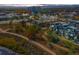 Stunning aerial view of a modern community surrounded by lush landscaping and walking trails at 5036 S Platte River Pkwy, Littleton, CO 80123