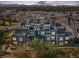 Aerial view of modern townhome community with mountain backdrop at 5036 S Platte River Pkwy, Littleton, CO 80123