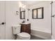 Modern bathroom featuring subway tiles, a tub and shower, and an updated vanity at 10600 E 25Th Ave, Aurora, CO 80010