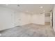 Bright bedroom with recessed lighting, white walls, and soft carpeting, providing a cozy atmosphere at 10600 E 25Th Ave, Aurora, CO 80010