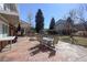 This outdoor patio features stone flooring and plenty of seating space at 9526 E Lake Ave, Greenwood Village, CO 80111