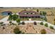 Expansive property featuring lush landscaping, a winding driveway, and a charming two-story home with a covered porch at 3967 Eastout Ave, Parker, CO 80138