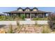 Charming two-story home with a welcoming porch and landscaped front yard at 3967 Eastout Ave, Parker, CO 80138