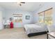 This main bedroom is bright and spacious with a vanity and ensuite bath at 3967 Eastout Ave, Parker, CO 80138