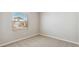 Carpeted bedroom featuring natural light, fresh paint, and clean trim at 48245 Shetland Dr, Bennett, CO 80102