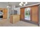 Bright dining area with sliding door and large cabinet with mirrored door at 4483 S Eagle Cir, Aurora, CO 80015
