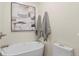 Modern bathroom with a freestanding tub and contemporary fixtures at 6866 W David Ave, Littleton, CO 80128