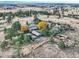 A captivating aerial view of a property with lush trees and natural surroundings at 8700 Flintwood Rd, Parker, CO 80138