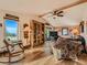 Inviting living room with a large window with great view and comfortable seating at 8700 Flintwood Rd, Parker, CO 80138