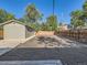 Large backyard with gravel and wood fence, showcasing outdoor space at 1731 Uinta St, Denver, CO 80220