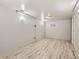 Spacious finished basement featuring neutral paint, plank flooring, and recessed lighting at 1731 Uinta St, Denver, CO 80220
