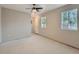 Bright bedroom with ceiling fan and natural light from the window at 1731 Uinta St, Denver, CO 80220