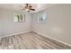 Bedroom featuring wood-look flooring, neutral paint and ceiling fan at 1731 Uinta St, Denver, CO 80220
