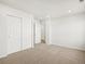 Carpeted bedroom with closet and natural light, offering a cozy retreat at 6068 Hourglass Dr, Brighton, CO 80601
