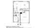 First floor plan showcasing the layout of the home including the kitchen, great room, and garage at 6068 Hourglass Dr, Brighton, CO 80601