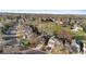 Real estate showcasing nearby park, mature trees, well-kept homes, and inviting curb appeal at 12734 Eudora Dr, Thornton, CO 80241
