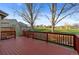 Exterior view of the back deck with railings overlooking the lawn at 12734 Eudora Dr, Thornton, CO 80241