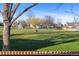 View of a lush community park, providing ample space for recreation, seen from a nearby home at 12734 Eudora Dr, Thornton, CO 80241