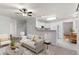 Open-concept living area with view into kitchen and dining space at 12734 Eudora Dr, Thornton, CO 80241