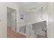 Bright stairway with skylight and modern pendant lighting at 12734 Eudora Dr, Thornton, CO 80241