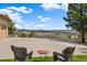 View from patio with seating, showcasing a vast landscape view at 18496 Pixie Park Rd, Monument, CO 80132