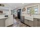 Stylish kitchen with stainless steel appliances, white countertops, and a farmhouse sink at 13215 Peacock Dr, Lone Tree, CO 80124