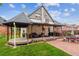 Backyard featuring an outdoor dining space, gazebo, and built-in grill at 912 S Washington St, Denver, CO 80209
